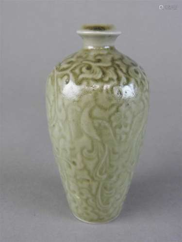 A small Longquan celadon vase, Song dynasty style, incised with an all over scrolling lotus design