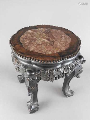 A Chinese rosewood and hardstone inset jardiniere stand, 19th century, the flower head form top with