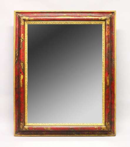 A GOOD LARGE DECORATIVE MIRROR, with red ground