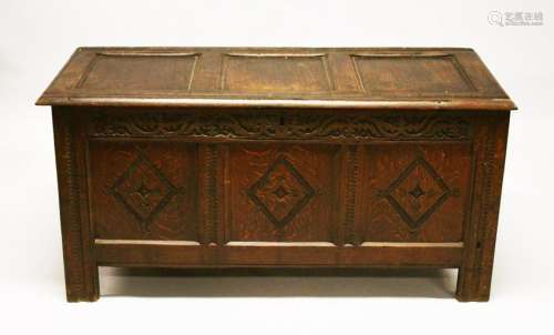AN 18TH CENTURY OAK COFFER, with triple panelled top