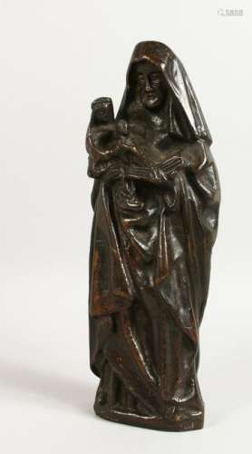 A 19TH CENTURY BRONZE OF MADONNA, holding two children