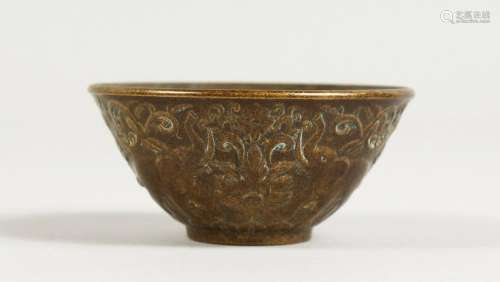 A SMALL BRONZE CUP.  2.5ins diameter.