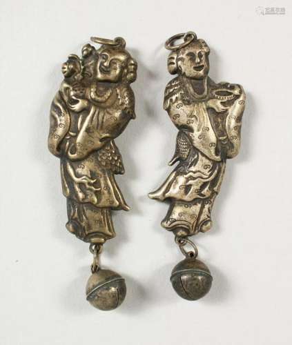 A PAIR OF CHINESE SILVER FIGURAL RATTLES.  3ins high.