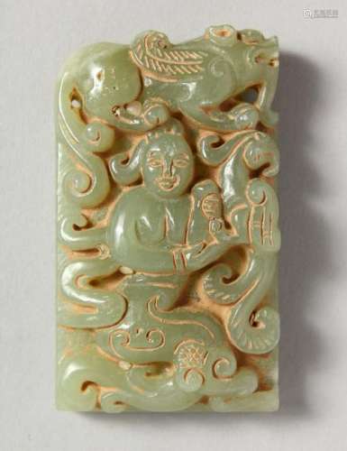A CARVED JADE PENDANT.  2.5ins high.