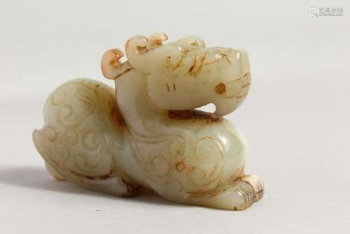 A CARVED JADE DRAGON.  3ins long.