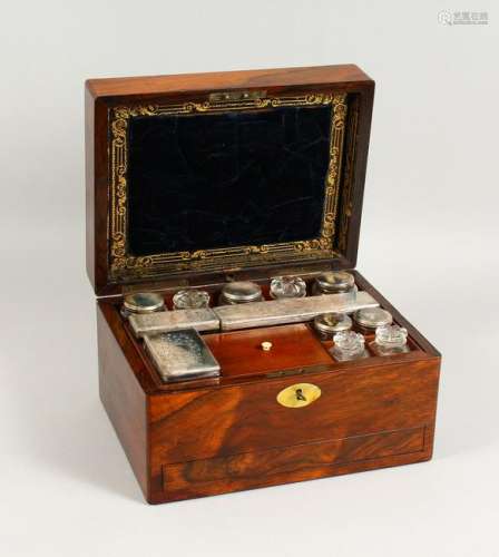 A VICTORIAN ROSEWOOD DRESSING TABLE BOX, the fitted