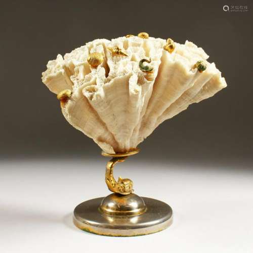 AN UNUSUAL WHITE CORAL SCULPTURE, mounted with gilt