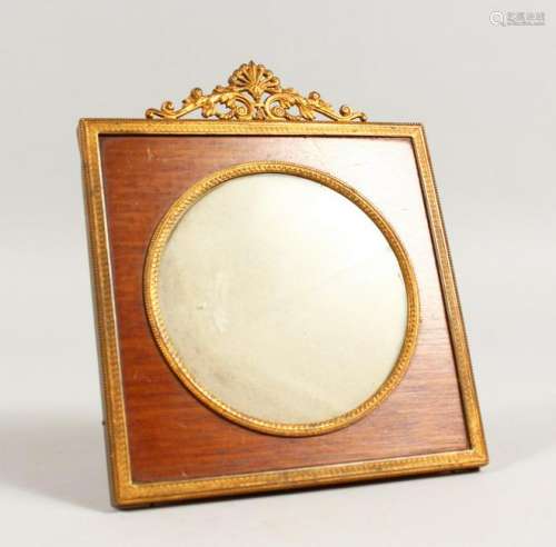 A SMALL EMPIRE STYLE GILT METAL PHOTOGRAPH FRAME, with