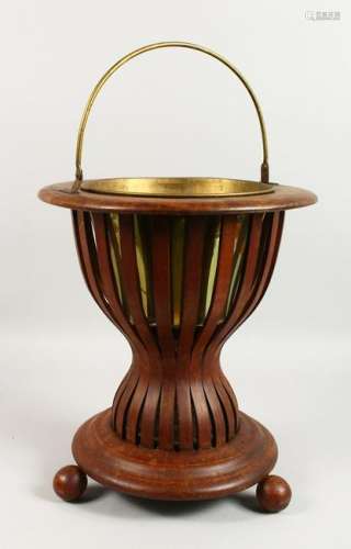 A DUTCH MAHOGANY JARDINIERE, with brass liner.  16ins