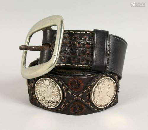 AN UNUSUAL LEATHER BELT, mounted with eight silver