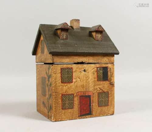 A PAINTED HOUSE STYLE TEA CADDY.  6.25ins wide.