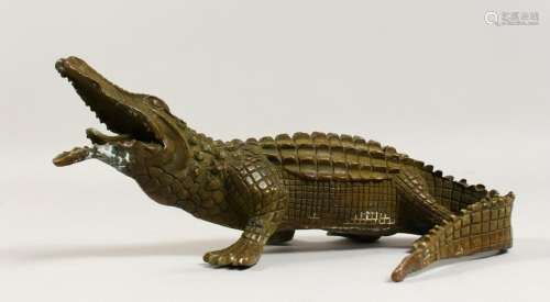 A BRONZE MODEL OF A CROCODILE.  9.5ins long.