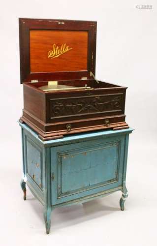 A STELLA MAHOGANY CASE POLYPHON, playing 17-inch discs,