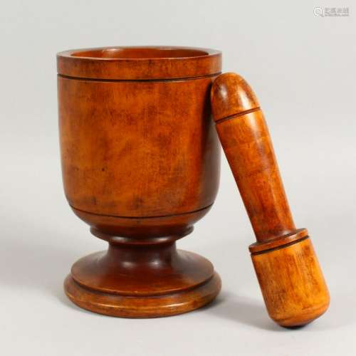 A 19TH/20TH CENTURY PESTLE AND MORTAR, possibly