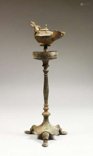 A BYZANTINE BRONZE LAMP AND STAND, 6TH CENTURY.  13ins