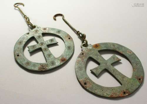 TWO BYZANTINE BRONZE OPENWORK DISCS with central cross.