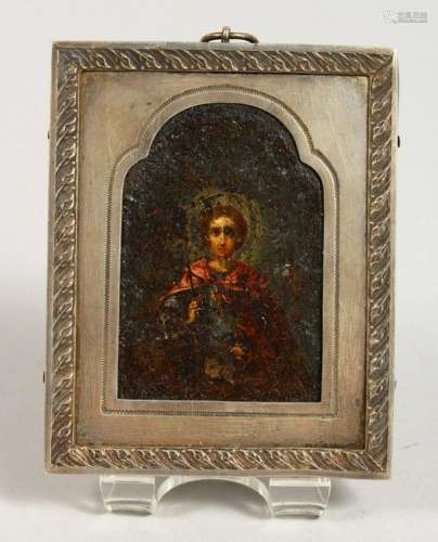 A RUSSIAN ICON, in a silver frame.  84 head and makers