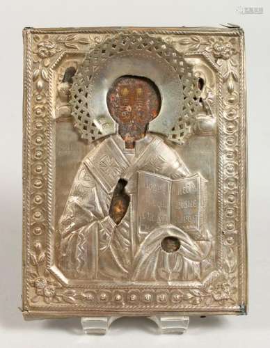 A RUSSIAN SILVER ICON.  Priest.  5ins x 4ins.
