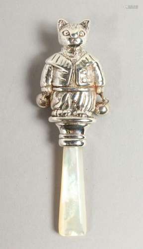 A SILVER CAT SHAPED RATTLE.