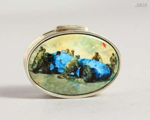 A SILVER OVAL PILL BOX, with enamel lid depicting a
