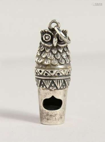 A CAST SILVER NOVELTY OWL WHISTLE.  1.5ins long.