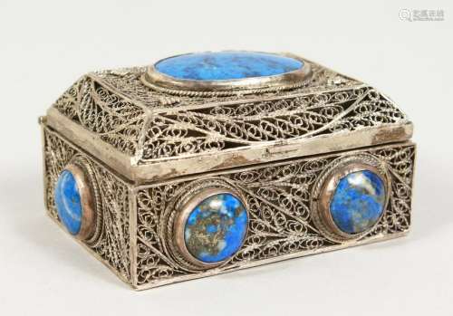 A RUSSIAN SILVER, FILIGREE AND LAPIS BOX.  3ins long.