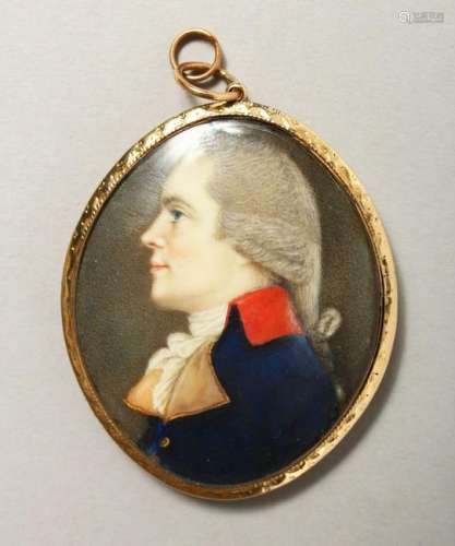 AN 18TH CENTURY PORTRAIT MINIATURE of a man in a blue