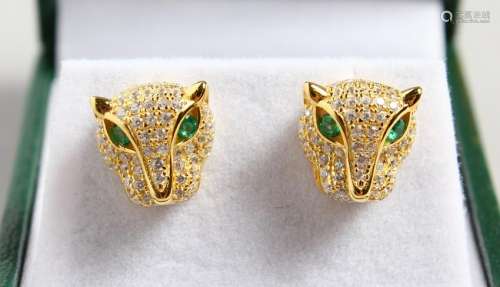 A PAIR OF GOLD PLATE PANTHER EARRINGS.