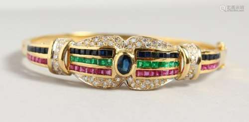 AN IMPRESSIVE 18CT YELLOW GOLD BANGLE, set with ruby,