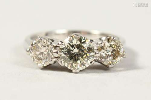 AN 18CT WHITE GOLD THREE STONE DIAMOND RING of 1.56CTS.