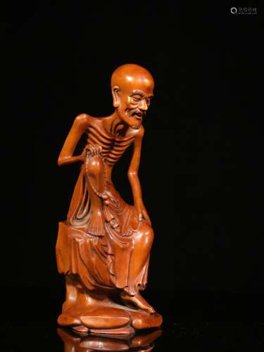 A Chinese Carved Boxwood Figure of Luohan