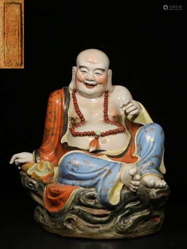 A Chinese Famille-Rose Porcelain Figure of Buddha