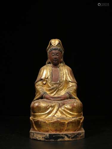 A Chinese Carved Nanmu Figure of Seated Buddha