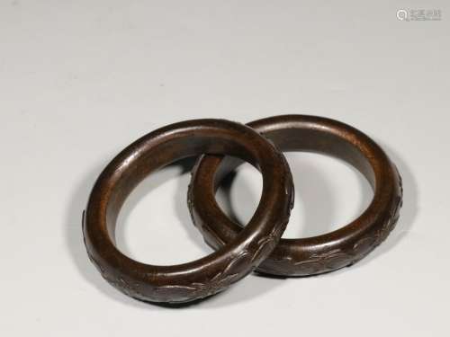 A Pair of Chinese Carved Agar-Wood Bracelet