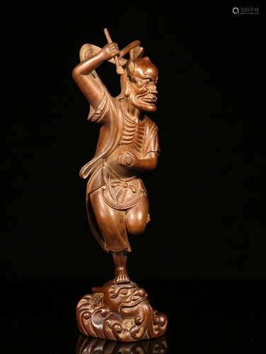 A Chinese Carved Boxwood Figure