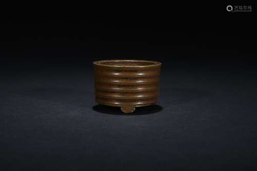 Qing dynasty copper tripod stove with bow string pattern