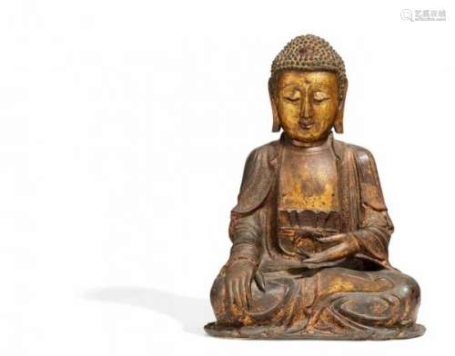 IMPORTANT BUDDHA SHAKYAMUNI. China. 17th c. Bronze with residue of lacquer gilding [...]
