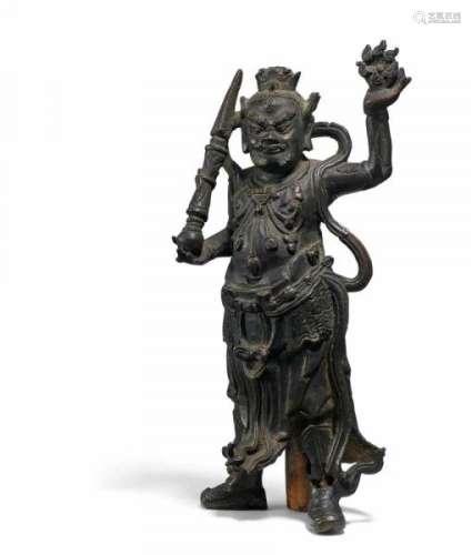 ATTENDANT OF BRAHMA WITH PHURBU AND FLAMING WHEEL. China. Ming/Qing dynasty. [...]