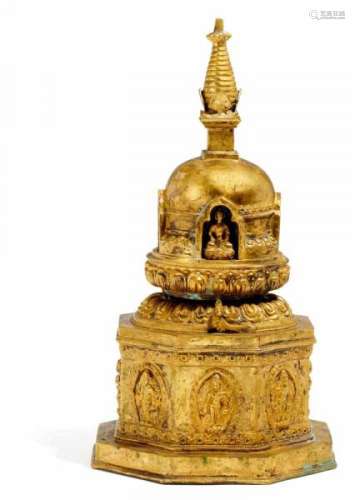 LARGE STUPA WITH SEPARATE FIGURES. Nepal. 19th/20th c. Heavy copper bronze with [...]