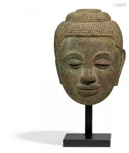 HEAD OF BUDDHA SHAKYAMUNI. Khmer. Post Angkor period (since 1431). Bronze with [...]