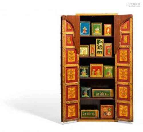 IMPORTANT COLLECTION OF GANJIFA PLAYCARDS IN A CABINET. India. 19th/20th c. partly [...]