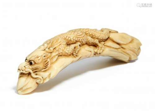 EXCEPTIONAL CARVING WITH DRAGON. Japan. Meiji period or later. Hippopotamus tooth [...]