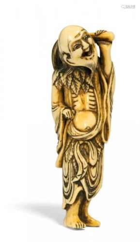NETSUKE: SENNIN CHOCHU WITH FLY WHISK. Japan. 18th c. Ivory with engravings stained [...]