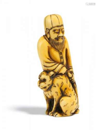 NETSUKE: WEST ASIAN MAN WITH TIGER. Japan. 18th c. Ivory with amber yellow patina. [...]