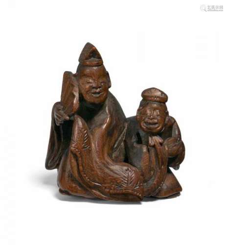 NETSUKE: TWO MANZAI DANCERS. Japan. 19th c. Dark wood. One with a fan in his hand, [...]