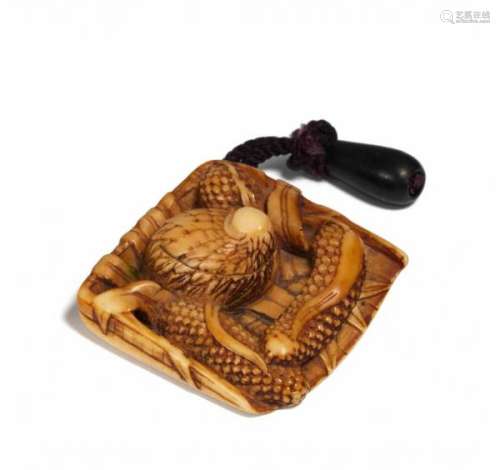 NETSUKE: QUAIL WITH MILLET ON BASKET CHUTE. Japan. 18th/19th c. Ivory with amber [...]