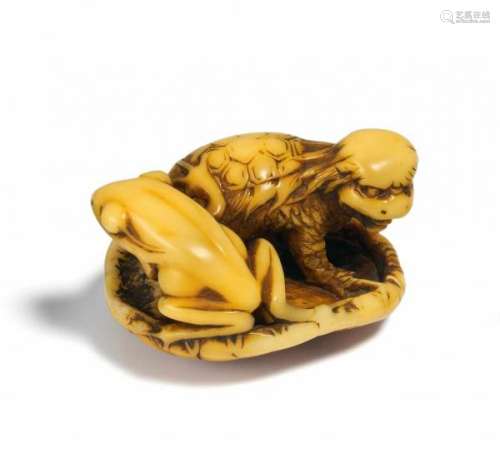 NETSUKE: KAPPA AND FROG ON LOTUS LEAF. Japan. 18th/19th c. Maritime ivory with a [...]