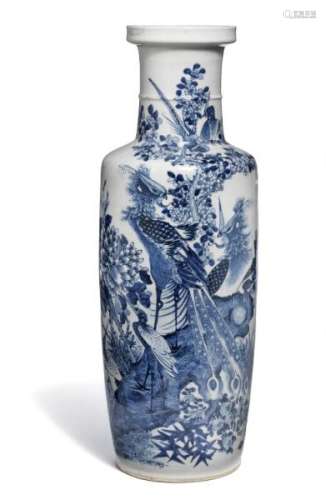 A Chinese porcelain rouleau vase in underglaze blue decorated  with peacock on rock [...]