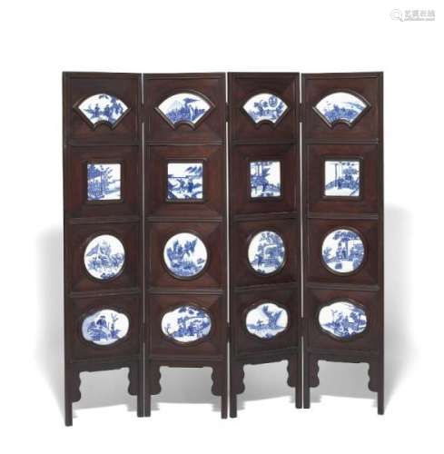A Chinese four-panel hardwood screen with inlaid porcelain plaques, decorated in [...]