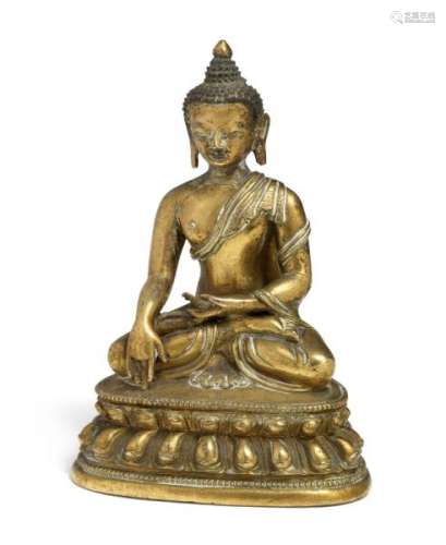 A Tibetan gilt bronze figure of Buddha Shakyamuni. 18th century. Weight 780 g. H. [...]